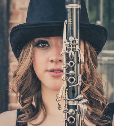 denver senior portrait of girl with clarinet and top hat