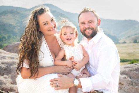 Denver family portraits of smiling famiy wearing white