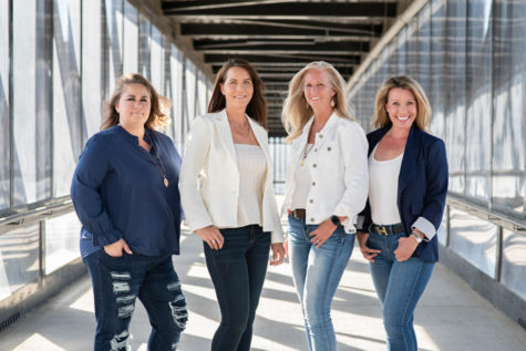 denver headshot group of women wearing white and blue