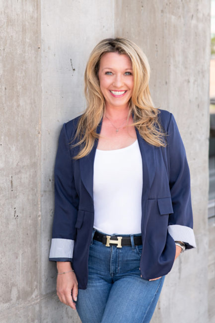denver headshot of realtor in a white shirt and blue jacket